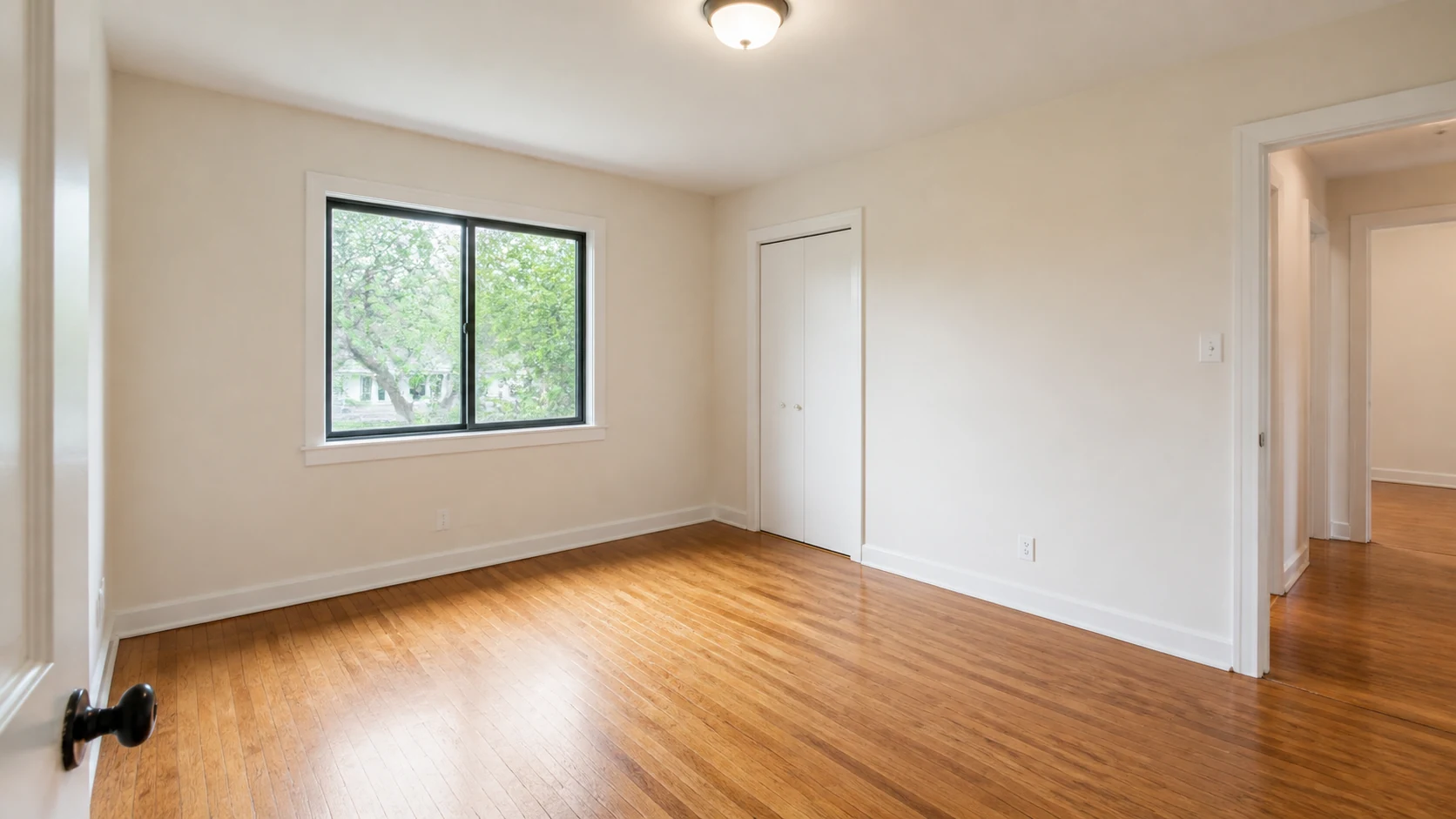 Original and staged primary-bedroom comparison: Before — original empty room
